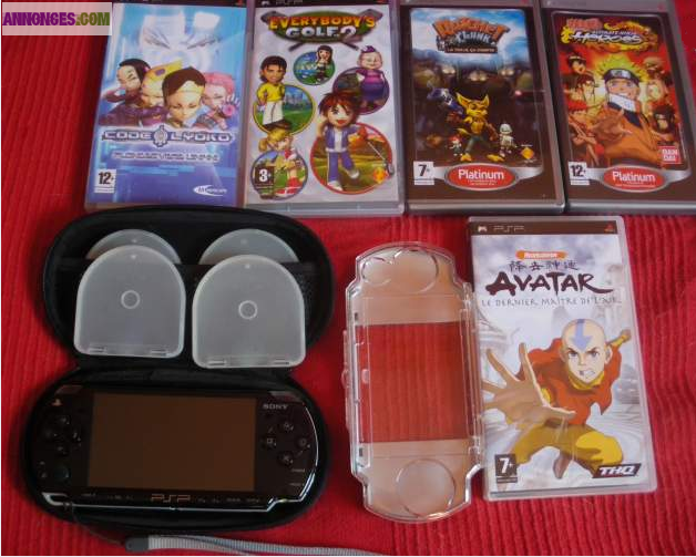 PSP Slim + 5 jeux + coque de protection + carte 2G