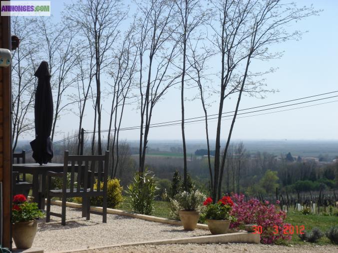 Maison bois vue panoramique sur estuaire